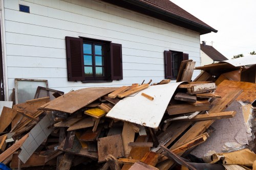 Variety of office furniture being cleared